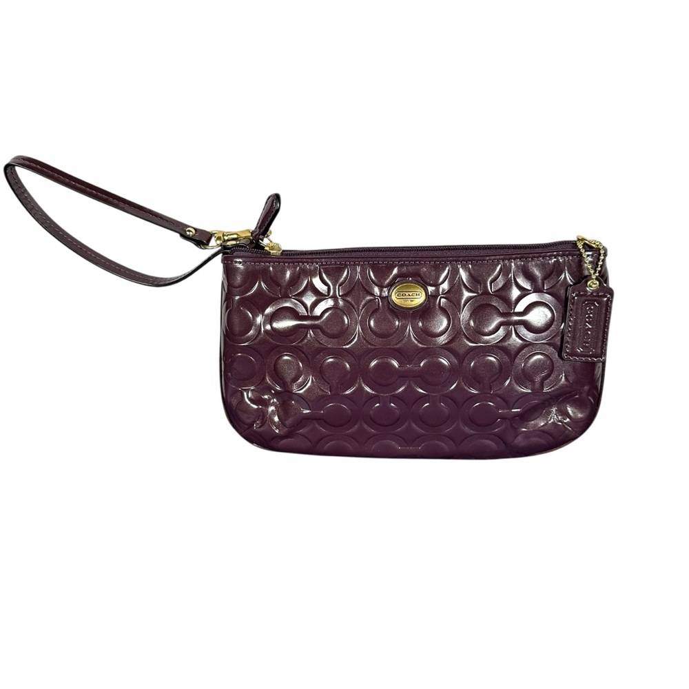COACH Large Peyton Embossed Patent Logo Wristlet in passion berry / Plum